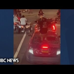 Viral video reveals biker atomize windshield, then pull gun on driver